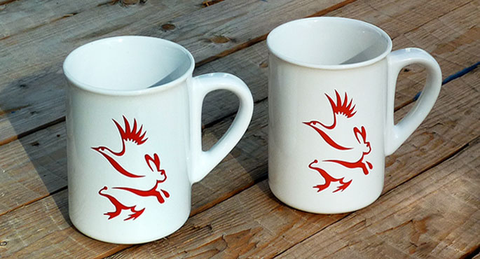 Corporate Design Tasse mit Logo Haus der Natur